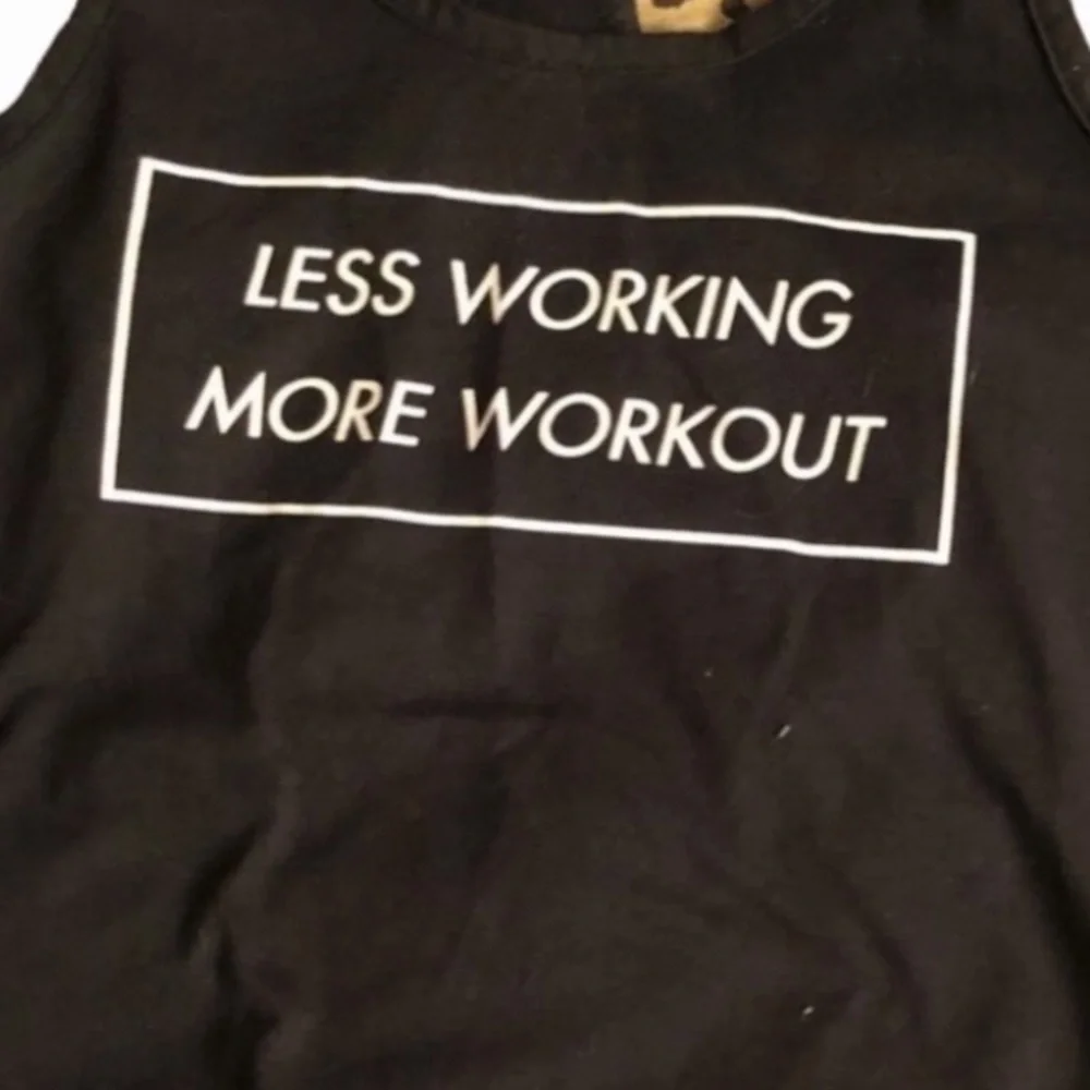Nike size small black racerback tank”less working more working out “ graphics